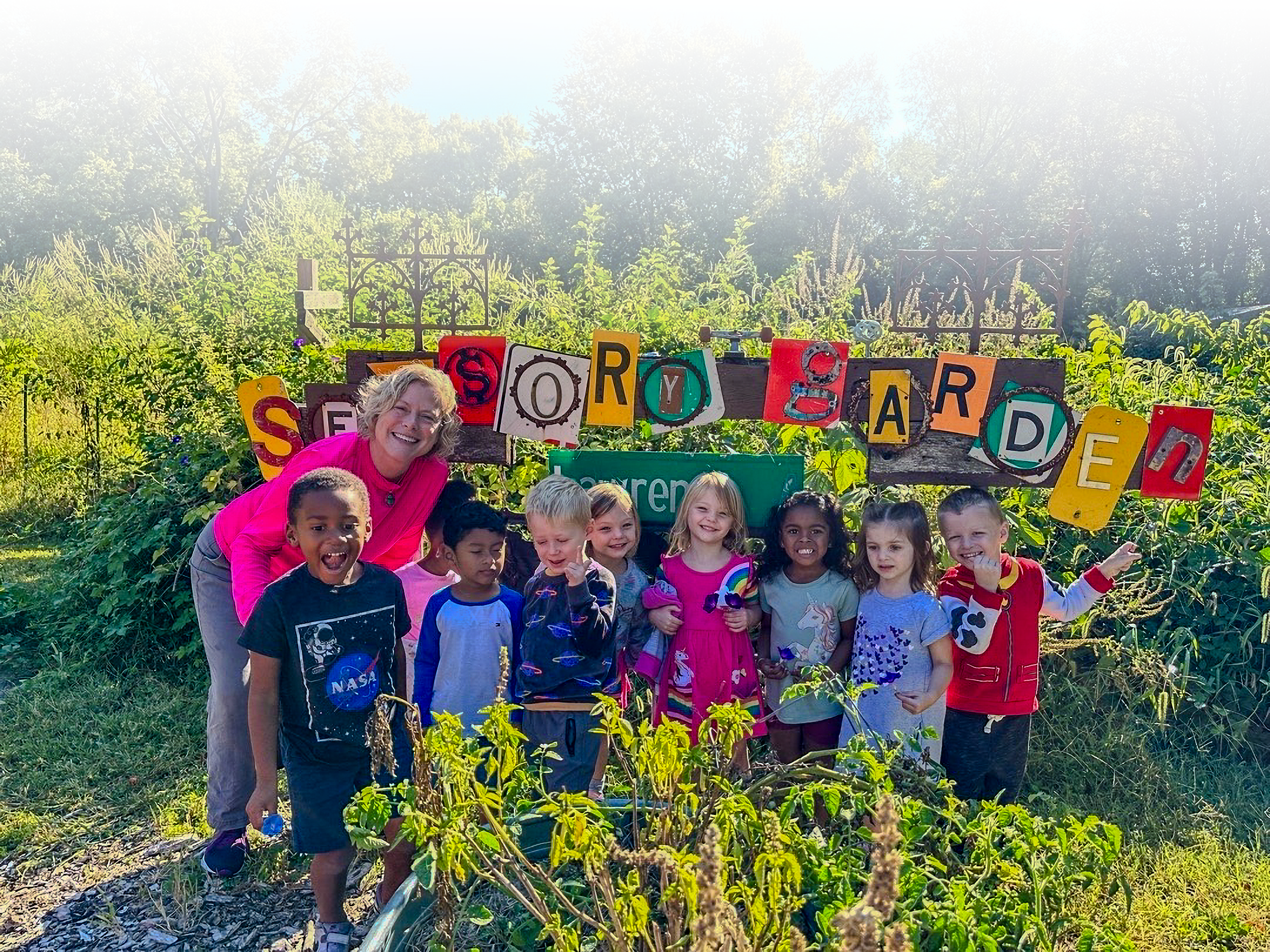 Nancy Boyda with kids at the Ballard Center